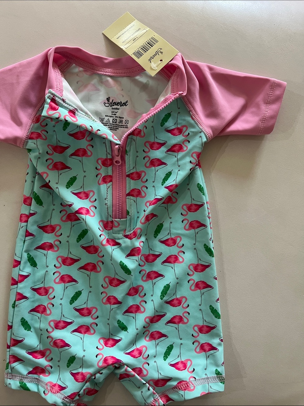 Sleeveless? No—Short-Sleeve Kids Pink & Aqua Flamingo Zip Rashguard by Sleevert